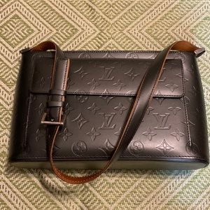 Beautiful authentic Louis Vuitton bag. Gun metal grey.